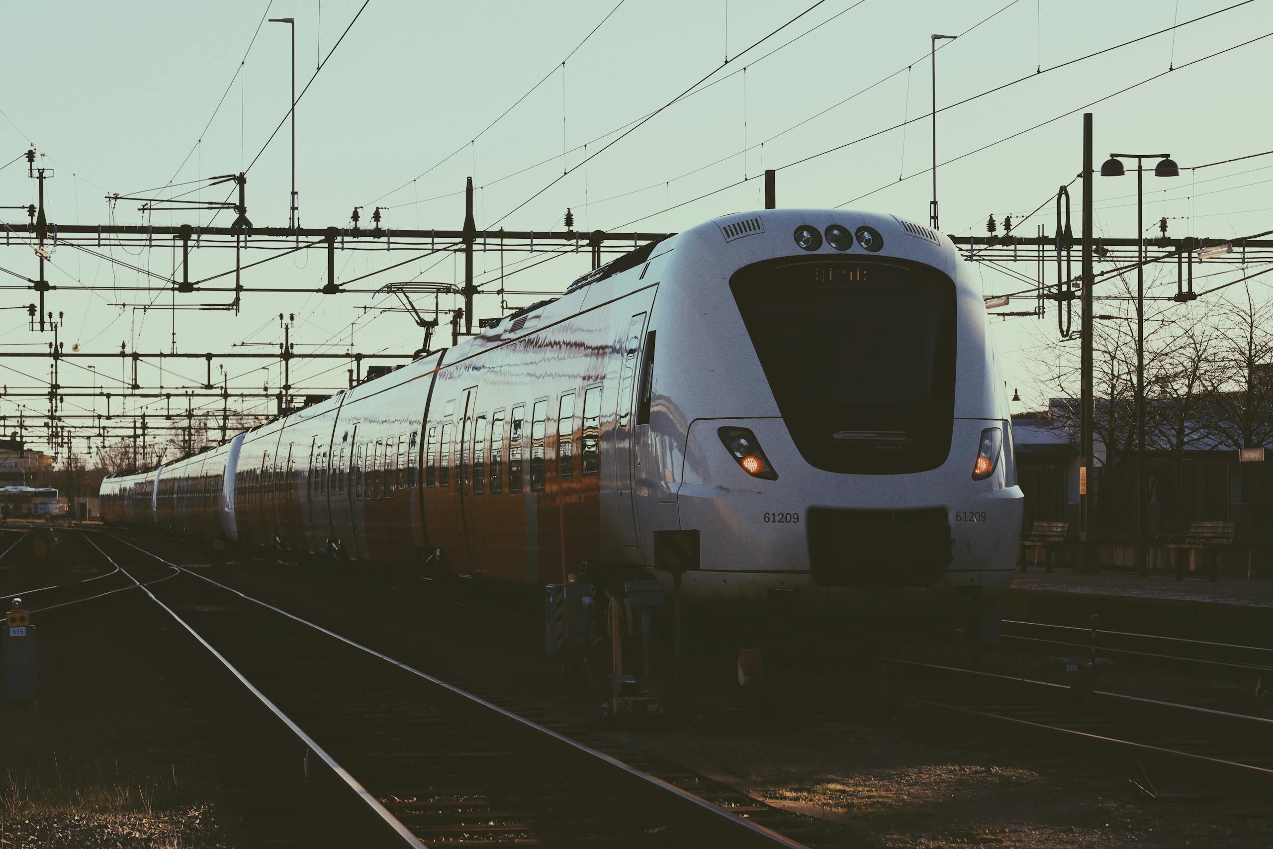 A sleek modern train at Norrköping railway station in Sweden, capturing transportation efficiency.